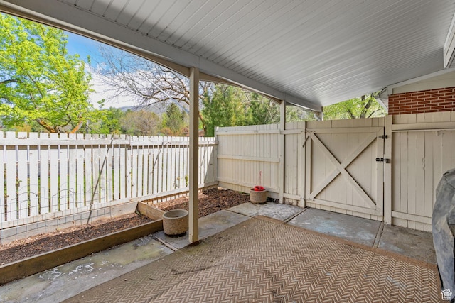 81 W Pheasantbrook Cir N, Centerville, UT 84014 - view of patio with a fenced backyard and a gate