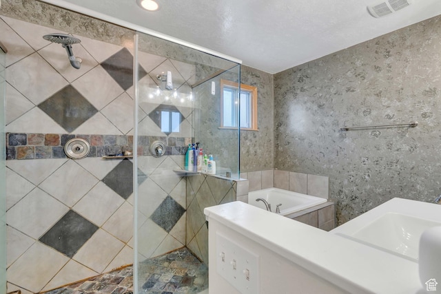 682 N 700 W, Provo, UT 84601 - bathroom featuring visible vents, a garden tub, and a stall shower