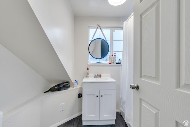 682 N 700 W, Provo, UT 84601 - bathroom with baseboards, vanity, and wood finished floors