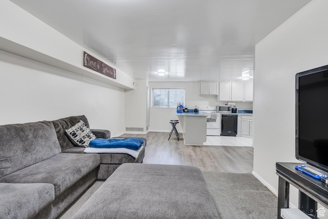 682 N 700 W, Provo, UT 84601 - living area with visible vents, light wood finished floors, and baseboards