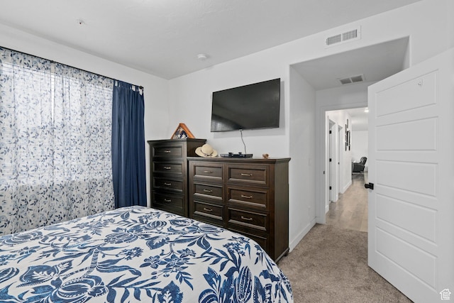 551 S 1020 W Unit 102, American Fork, UT 84003 - bedroom with baseboards, visible vents, and light colored carpet