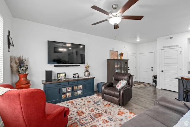 551 S 1020 W Unit 102, American Fork, UT 84003 - living room featuring a ceiling fan, wood finished floors, and visible vents