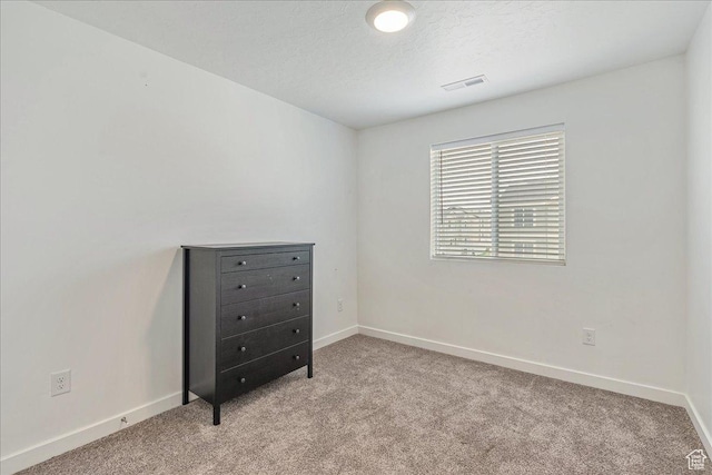 278 N Portside Ln, Saratoga Springs, UT 84045 - carpeted empty room with a textured ceiling, visible vents, and baseboards