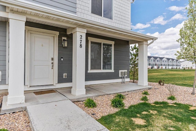 278 N Portside Ln, Saratoga Springs, UT 84045 - property entrance featuring a lawn and a porch