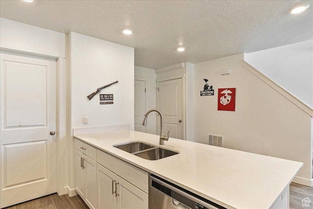 278 N Portside Ln, Saratoga Springs, UT 84045 - kitchen with stainless steel dishwasher, a sink, visible vents, recessed lighting, and light wood-style floors