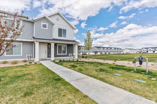 278 N Portside Ln, Saratoga Springs, UT 84045 - view of front of property with a porch, a front yard, and a residential view