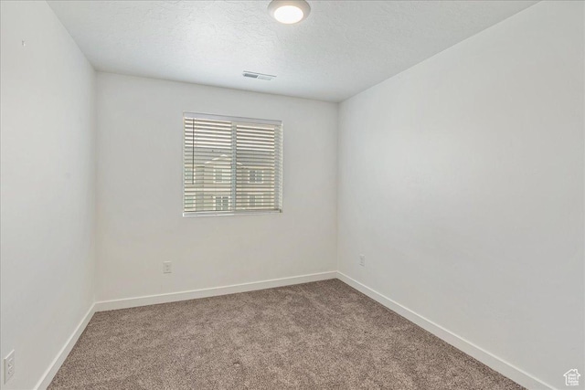278 N Portside Ln, Saratoga Springs, UT 84045 - empty room featuring visible vents, carpet flooring, and baseboards