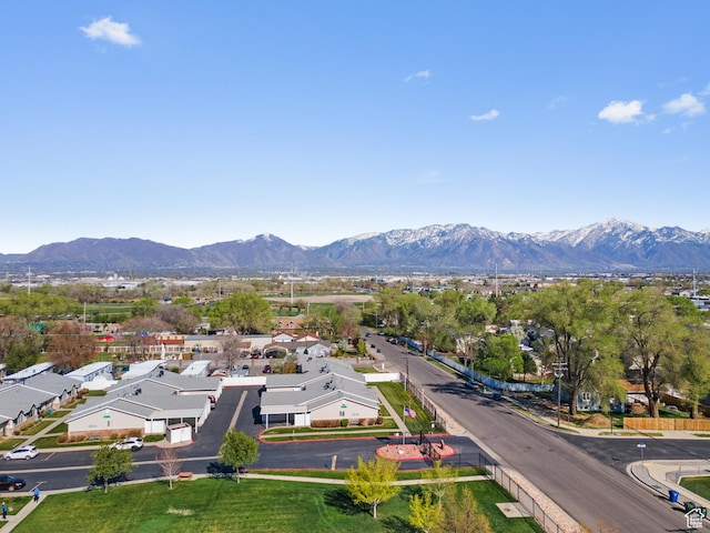 birds eye view of property featuring a mountain view and a residential view