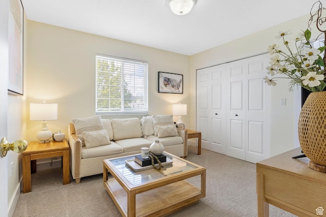 living room with light colored carpet