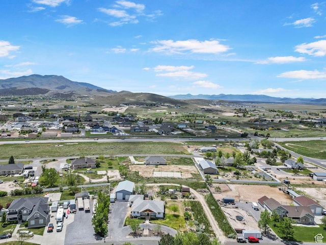 birds eye view of property with a residential view and a mountain view