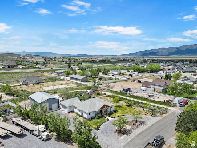 drone / aerial view featuring a mountain view and a residential view