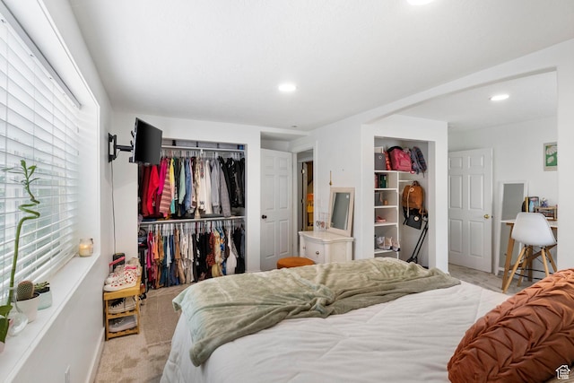 bedroom with baseboards, carpet, a closet, and recessed lighting