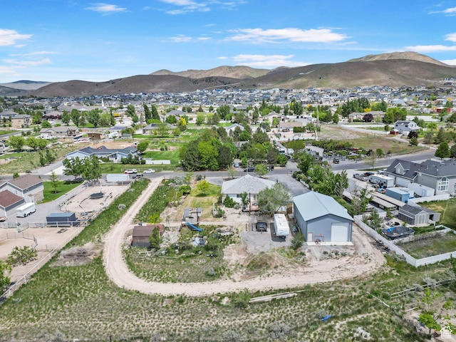 bird's eye view with a residential view and a mountain view