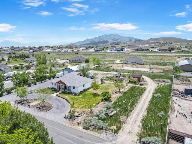 bird's eye view featuring a residential view and a mountain view