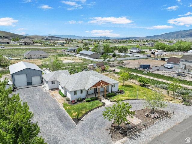 drone / aerial view with a mountain view and a residential view