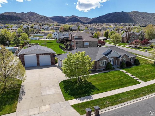 exterior space with a mountain view and a residential view