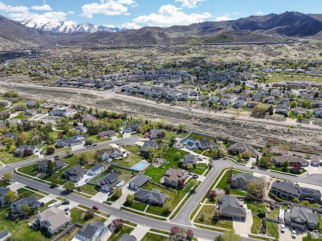 drone / aerial view with a residential view and a mountain view