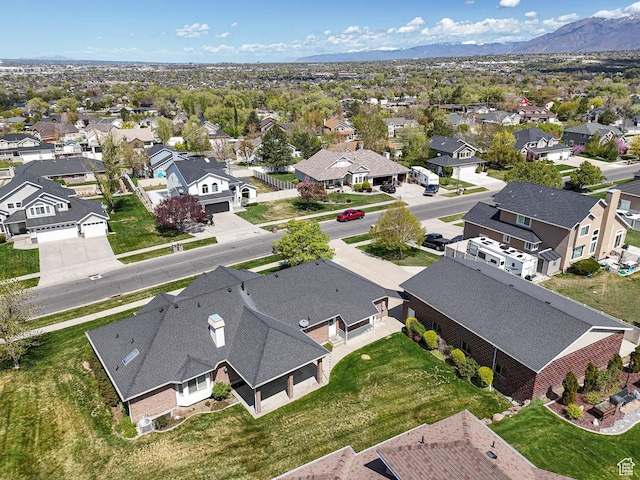 aerial view featuring a mountain view and a residential view
