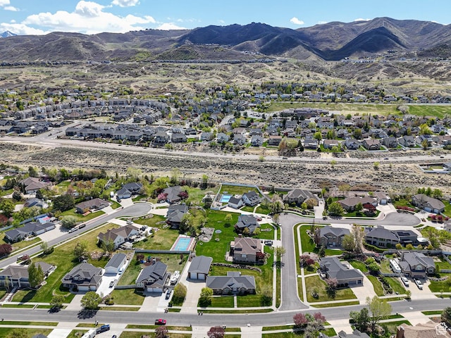 drone / aerial view with a mountain view and a residential view