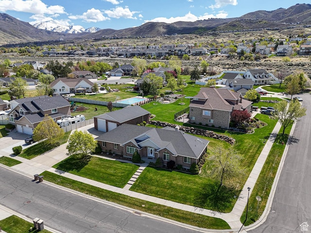 drone / aerial view with a mountain view and a residential view