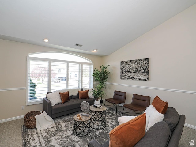 carpeted living area with lofted ceiling, baseboards, visible vents, and recessed lighting
