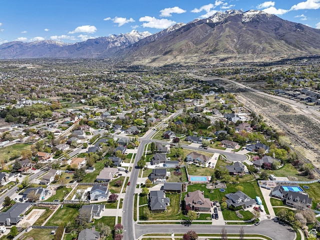 birds eye view of property with a residential view and a mountain view
