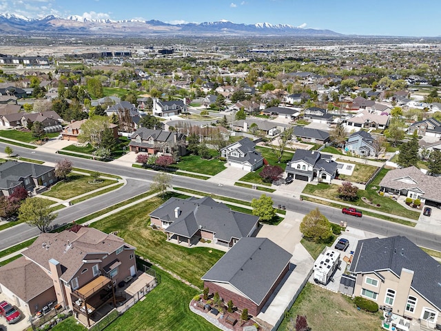 aerial view with a residential view and a mountain view