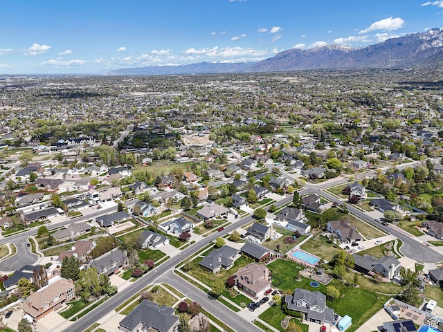 aerial view featuring a residential view and a mountain view