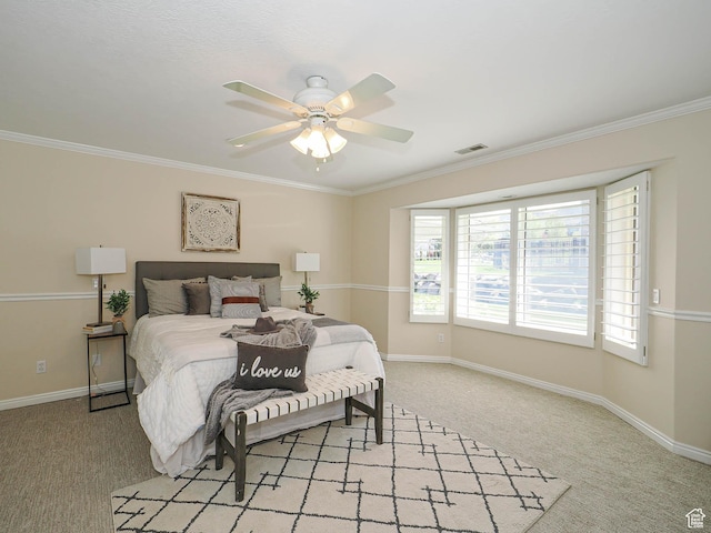 bedroom featuring visible vents, light carpet, and ornamental molding