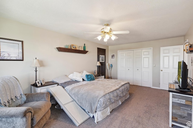 bedroom featuring carpet flooring, a closet, and a ceiling fan