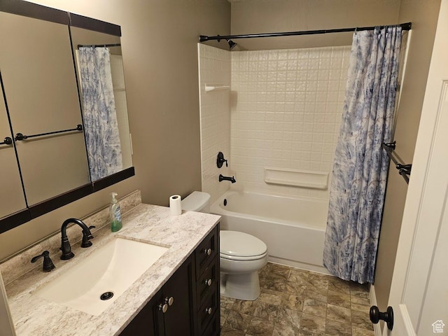 full bathroom featuring toilet, vanity, and shower / tub combo