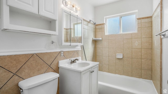 3760 S 3325 W, West Valley City, UT 84119 - bathroom with toilet, shower / bathtub combination, vanity, and tile walls