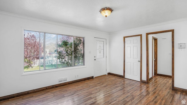 3760 S 3325 W, West Valley City, UT 84119 - interior space with ornamental molding, wood finished floors, multiple windows, and visible vents