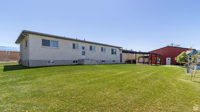 1642 W 2700 S, Syracuse, UT 84075 - rear view of property with brick siding and a yard