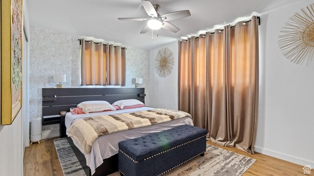 1642 W 2700 S, Syracuse, UT 84075 - bedroom with baseboards, a ceiling fan, and wood finished floors
