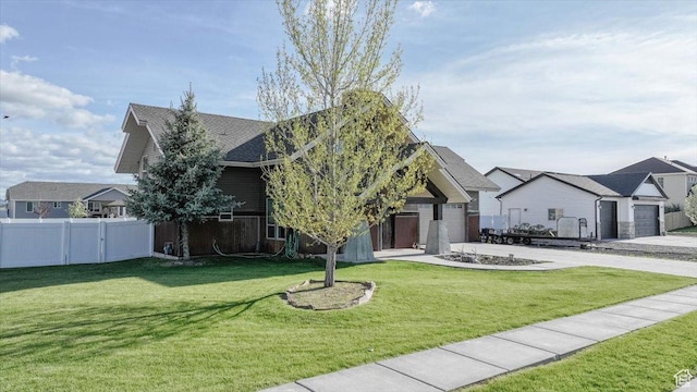 9 W Cedar Ln, Franklin, ID 83237 - view of front facade with driveway and an attached garage
