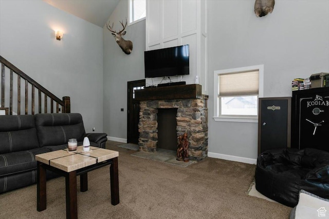 9 W Cedar Ln, Franklin, ID 83237 - living area featuring high vaulted ceiling, carpet flooring, stairs, and a stone fireplace