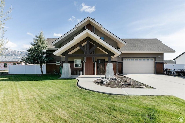 9 W Cedar Ln, Franklin, ID 83237 - view of front of home with a garage, concrete driveway, and a shingled roof