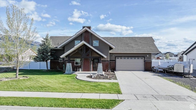 9 W Cedar Ln, Franklin, ID 83237 - view of front of home featuring driveway, a garage, a chimney, and roof with shingles