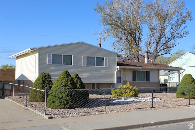 781 Bonneville Way, Tooele, UT 84074 - split level home with a fenced front yard
