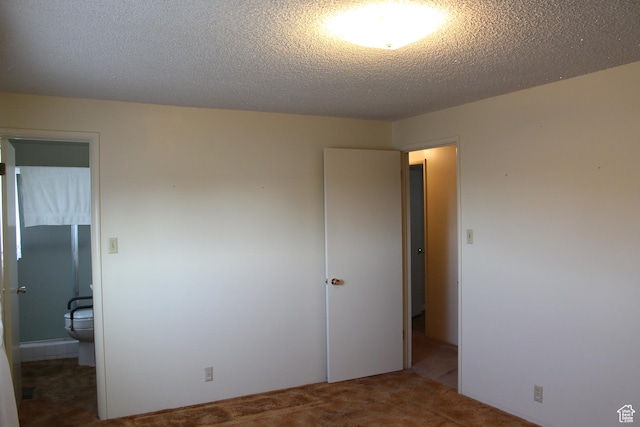 781 Bonneville Way, Tooele, UT 84074 - unfurnished bedroom with carpet flooring and a textured ceiling