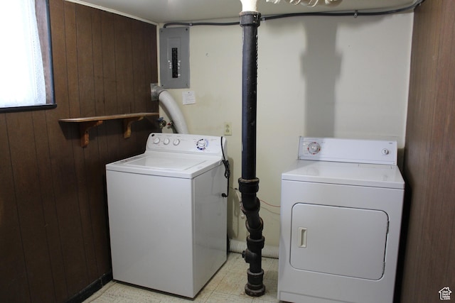 781 Bonneville Way, Tooele, UT 84074 - laundry room with wooden walls, electric panel, laundry area, and washer and clothes dryer