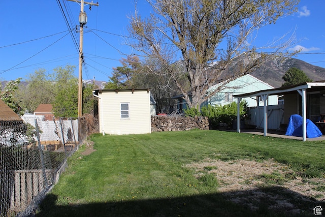 781 Bonneville Way, Tooele, UT 84074 - view of yard with fence and an outbuilding