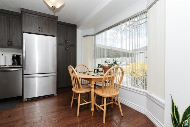 449 S 2nd E, Preston, ID 83263 - dining space with a healthy amount of sunlight and dark wood-type flooring