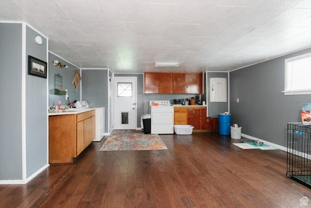 449 S 2nd E, Preston, ID 83263 - kitchen with light countertops, brown cabinets, and washer / dryer