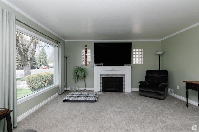 449 S 2nd E, Preston, ID 83263 - carpeted living area with a stone fireplace, visible vents, crown molding, and baseboards