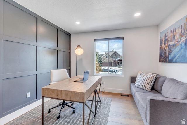 2696 W Red Robin Ct, Lehi, UT 84043 - office area featuring light wood finished floors, baseboards, recessed lighting, and visible vents