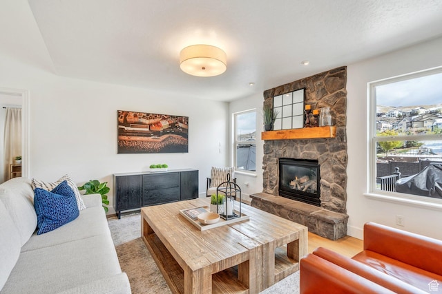 2696 W Red Robin Ct, Lehi, UT 84043 - living room with a fireplace and baseboards