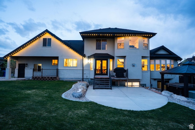 2696 W Red Robin Ct, Lehi, UT 84043 - rear view of house featuring a gazebo, a lawn, french doors, a patio, and brick siding