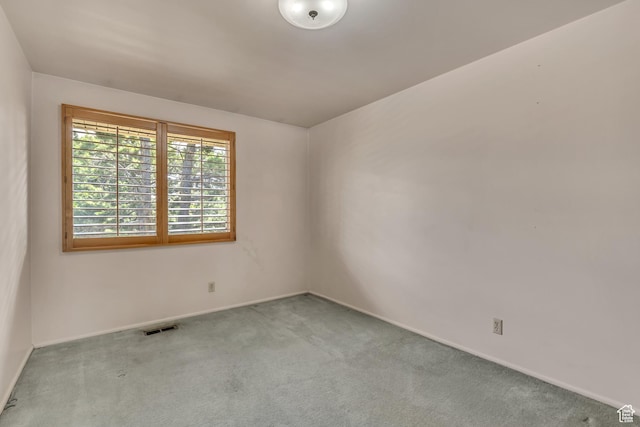 371 E 6770 S, Midvale, UT 84047 - spare room featuring carpet and baseboards